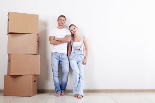 Removal team planning a house move on a Chelsea street