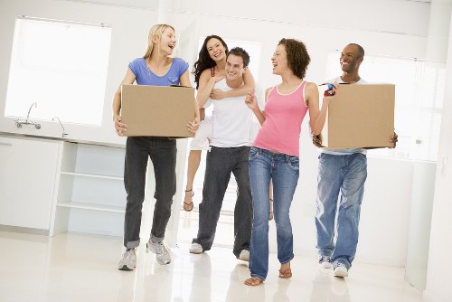 Removalists loading household furniture in Chelsea