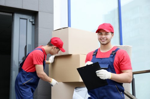 Removal van parked for a Chelsea home move near period properties
