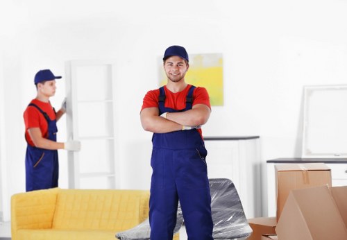 Student removals team preparing boxes for a move in Chelsea