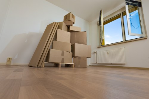 Removing bulky furniture from a Chelsea flat with careful handling