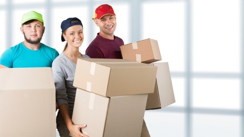 Packed boxes and furniture ready for a flat move in Chelsea