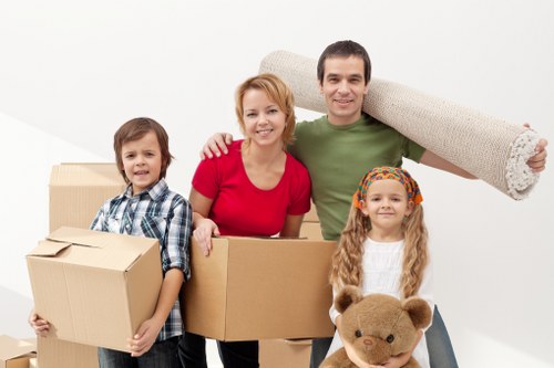 Local van loading boxes and household items in Chelsea